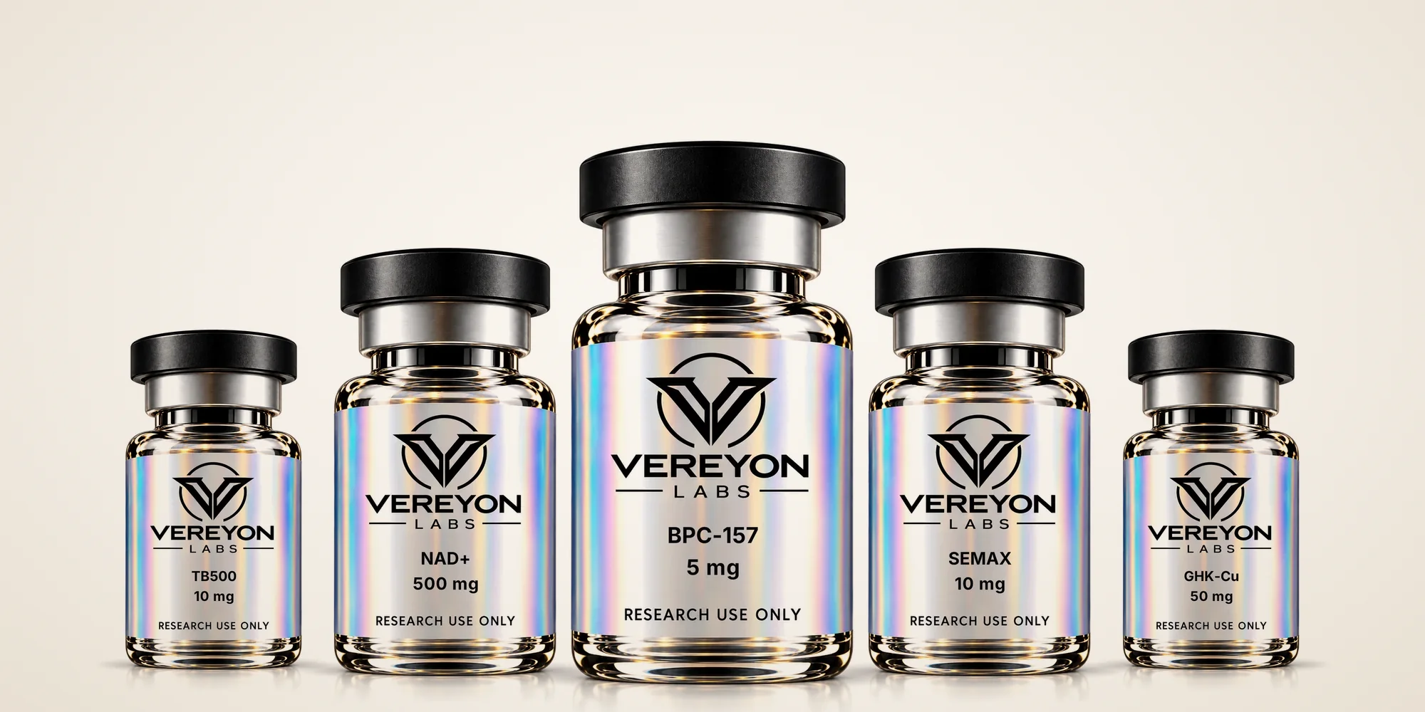 VEREYON LABS research vials in the studio: TB500 10 mg, NAD+ 500 mg, BPC-157 5 mg, Semax 10 mg and GHK-Cu 50 mg